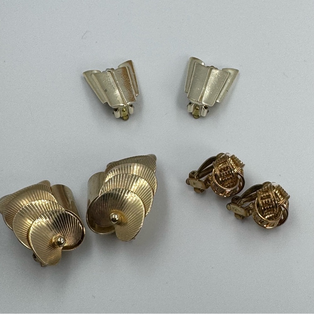 Vintage Gold Tone Clip On Earrings Love Knots Cascading and Geometric Styles